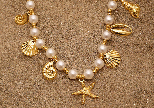 Multiple Charms with White Pearl Rope Necklace